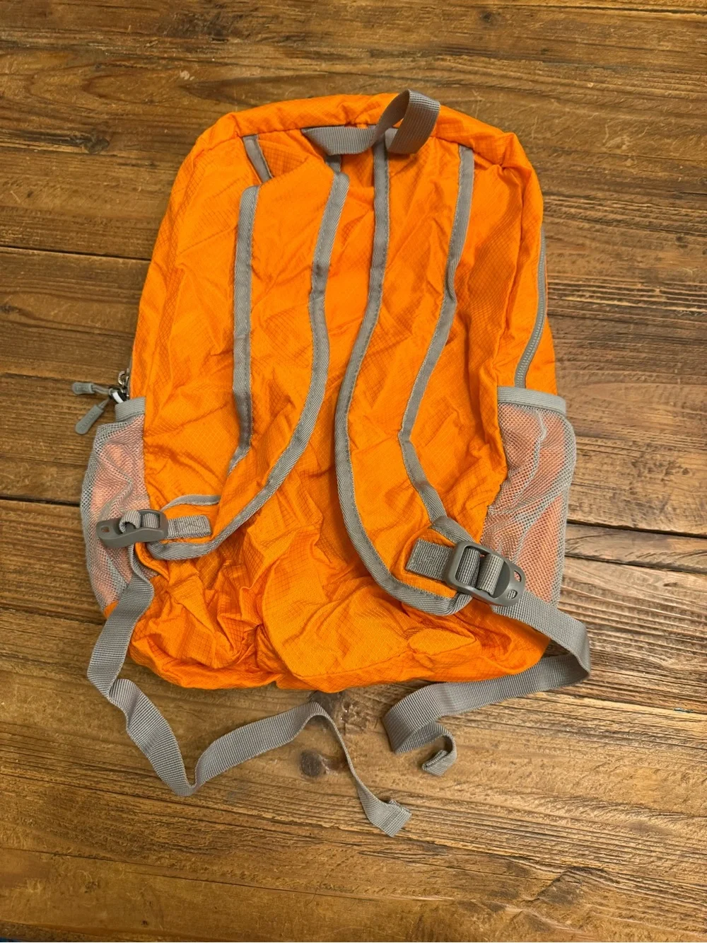A33 -Compact Orange Packable Men's Backpack